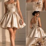Embellished satin dress with pearl and metallic beadwork, shown from multiple angles